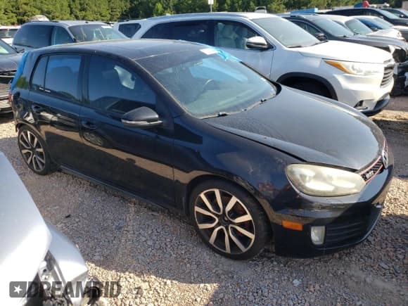 ✅ 2012 Volkswagen Golf GTI w/Sunroof & Navi • VIN: WVWHV7AJ7CW212657 • Lot: 70322324. Listed on Copart with 223,184 mi. Free auction sales archive from the USA and detailed vehicle history report at DreamBid. Image 4.