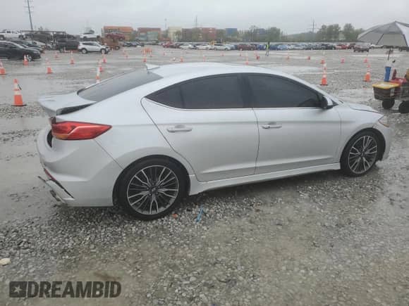 2018 Hyundai Elantra Sport с VIN KMHD04LB5JU509934, выставлен на аукционе Copart как лот 82278295 с пробегом 150 212 миль миль и Списание • Salvage title. История ставок и продаж доступна на DreamBid. Изображение 3.