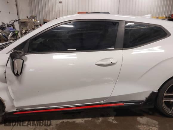 2020 Hyundai Veloster z VIN KMHT36AHXLU007297, wystawiony jako IAAI lot #41557520 z przebiegiem 42 934 mil mil oraz . Historia ofert i sprzedaży dostępna na DreamBid. Obrazek 14.