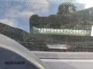 ✅ 2007 Jeep Commander Sport • VIN: 1J8HG48K77C686082 • Lot: 93327425. Listed on Copart with 151,807 mi. Free auction sales archive from the USA and detailed vehicle history report at DreamBid. Image 12.