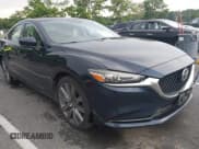 ✅ 2020 Mazda 6 Touring • VIN: JM1GL1VM7L1523876 • Lot: 42639206. Listed on IAAI with 156,259 mi. Free auction sales archive from the USA and detailed vehicle history report at DreamBid. Image 1.