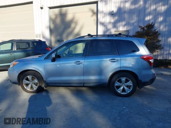 ✅ 2014 Subaru Forester Limited • VIN: JF2SJAHC5EH443748 • Lot: 43853197. Listed on IAAI with 127,520 mi. Free auction sales archive from the USA and detailed vehicle history report at DreamBid. Image 14.