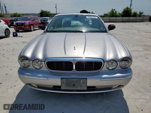 ✅ 2004 Jaguar XJ 8 • VIN: SAJEA71C34SG03026 • Лот: 60803165. Опубликован ранее на Copart с пробегом 96 219 миль. Бесплатный доступ к архиву аукционных продаж из США и подробный отчёт об истории автомобиля на DreamBid. Изображение 5.