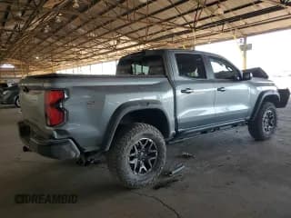✅ 2023 Chevrolet Colorado 4WD ZR2 • VIN: 1GCPTFEK1P1212882 • Лот: 71502184. Опубликован ранее на Copart с пробегом 12 342 миль. Бесплатный доступ к архиву аукционных продаж из США и подробный отчёт об истории автомобиля на DreamBid. Изображение 3.