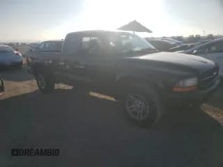 ✅ 2003 Dodge Dakota Sport • VIN: 1D7HL32X23S358513 • Lot: 84044454. Wystawiony na Copart z przebiegiem 233 909 mil. Bezpłatny archiwum sprzedaży aukcyjnych z USA i szczegółowy raport historii pojazdu na DreamBid. Zdjęcie 4.