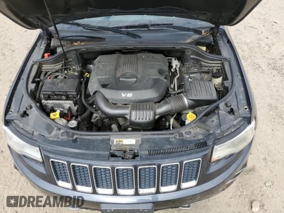 ✅ 2015 Jeep Grand Cherokee Overland • VIN: 1C4RJFCG1FC115844 • Lot: 47490555. Listed on Copart with 215,263 mi. Free auction sales archive from the USA and detailed vehicle history report at DreamBid. Image 13.