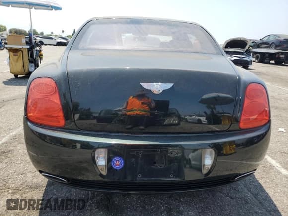 ✅ 2007 Bentley Flying Spur • VIN: SCBBR93WX7C049124 • Лот: 64689435. Опубликован ранее на Copart с пробегом 83 670 миль. Бесплатный доступ к архиву аукционных продаж из США и подробный отчёт об истории автомобиля на DreamBid. Изображение 6.