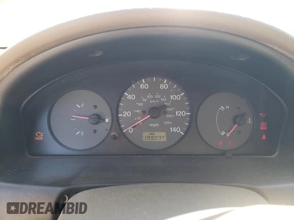 ✅ 1999 Mazda Protege DX • VIN: JM1BJ2226X0182555 • Lot: 71795515. Wystawiony na Copart z przebiegiem 199 035 mil. Bezpłatny archiwum sprzedaży aukcyjnych z USA i szczegółowy raport historii pojazdu na DreamBid. Zdjęcie 9.