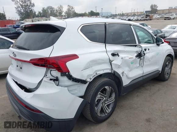 ✅ 2023 Hyundai Santa Fe SE • VIN: 5NMS14AJ5PH562703 • Lot: 43627051. Listed on IAAI with 38,143 mi. Free auction sales archive from the USA and detailed vehicle history report at DreamBid. Image 4.