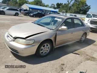 2002 Honda Accord EX с VIN 1HGCG56682A104803, выставлен на аукционе Copart как лот 70052125 с пробегом 277 321 миль миль и Списание • Salvage title. История ставок и продаж доступна на DreamBid. Изображение 1.