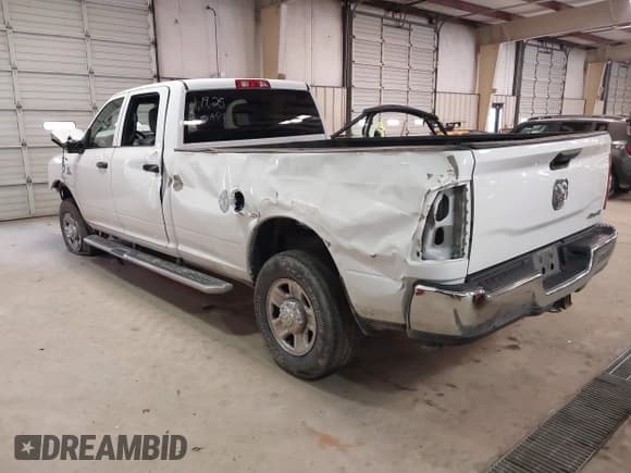 ✅ 2023 Ram 2500 Tradesman • VIN: 3C6UR5HL0PG529660 • Lot: 41491722. Listed on IAAI with 43,672 mi. Free auction sales archive from the USA and detailed vehicle history report at DreamBid. Image 3.
