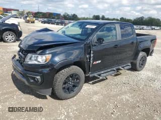 ✅ 2021 Chevrolet Colorado 4WD Z71 • VIN: 1GCGTDEN9M1175316 • Лот: 81660645. Опубликован ранее на Copart с пробегом 90 820 миль. Бесплатный доступ к архиву аукционных продаж из США и подробный отчёт об истории автомобиля на DreamBid. Изображение 1.