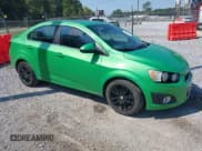 ✅ 2014 Chevrolet Sonic LT • VIN: 1G1JC5SH9E4224940 • Lot: 43197953. Listed on IAAI with 128,391 mi. Free auction sales archive from the USA and detailed vehicle history report at DreamBid. Image 1.