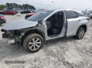 ✅ 2016 Lexus RX 350 • VIN: 2T2BZMCA4GC020161 • Lot: 52846525. Listed on Copart with 154,391 mi. Free auction sales archive from the USA and detailed vehicle history report at DreamBid. Image 1.