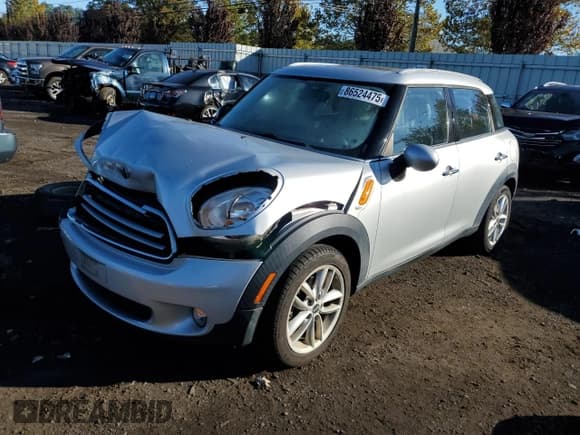 ✅ 2012 MINI Countryman • VIN: WMWZB3C53CWM04015 • Lot: 86524475. Listed on Copart with 103,008 mi. Free auction sales archive from the USA and detailed vehicle history report at DreamBid. Image 1.