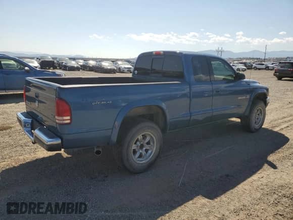 2002 Dodge Dakota SLT with VIN 1B7GG42N32S618480, listed as a Copart auction lot 66386755 with 106,001 mi miles and Clean title. Bid and sale history available at DreamBid. Image 3.