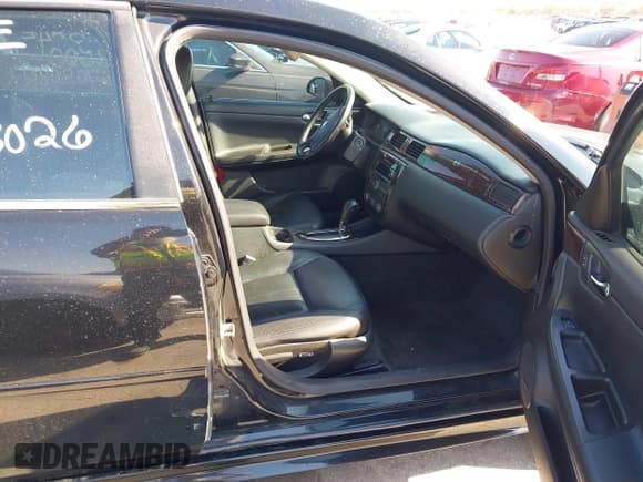 ✅ 2014 Chevrolet Impala LTZ • VIN: 2G1WC5E38E1185498 • Lot: 43716267. Listed on IAAI with 143,822 mi. Free auction sales archive from the USA and detailed vehicle history report at DreamBid. Image 5.