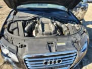 ✅ 2011 Audi A8 • VIN: WAUAVAFDXBN016571 • Лот: 91228765. Опубликован ранее на Copart с пробегом 115 155 миль. Бесплатный доступ к архиву аукционных продаж из США и подробный отчёт об истории автомобиля на DreamBid. Изображение 11.