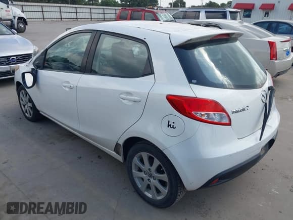 ✅ 2013 Mazda 2 Touring • VIN: JM1DE1LY1D0160324 • Lot: 42750502. Listed on IAAI with 137,043 mi. Free auction sales archive from the USA and detailed vehicle history report at DreamBid. Image 3.