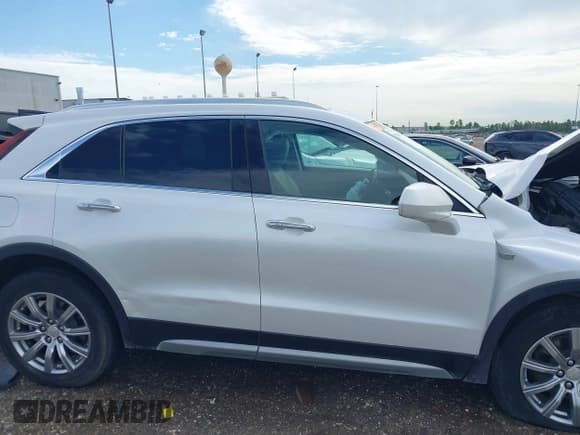✅ 2020 Cadillac XT4 FWD Premium Luxury • VIN: 1GYFZCR4XLF041500 • Lot: 42449396. Listed on IAAI with 87,147 mi. Free auction sales archive from the USA and detailed vehicle history report at DreamBid. Image 13.