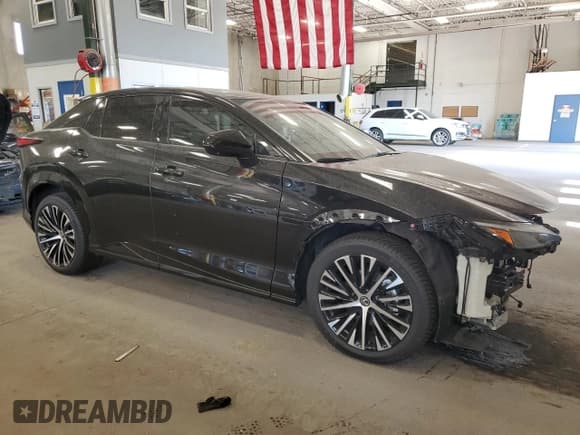 ✅ 2023 Lexus RZ 450e Premium • VIN: JTJAAAAB7PA002286 • Lot: 76578644. Listed on Copart with 2,452 mi. Free auction sales archive from the USA and detailed vehicle history report at DreamBid. Image 4.