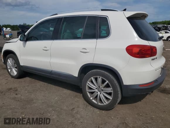 ✅ 2013 Volkswagen Tiguan SE • VIN: WVGBV7AX7DW512304 • Lot: 55928365. Listed on Copart with 142,520 mi. Free auction sales archive from the USA and detailed vehicle history report at DreamBid. Image 2.
