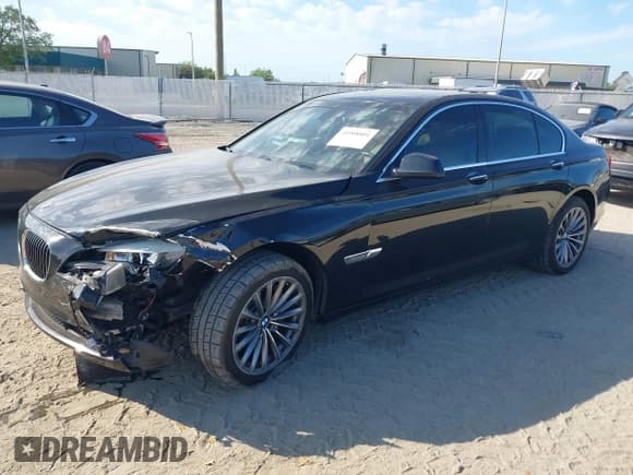 ✅ 2012 BMW 7 Series 740i • VIN: WBAKA4C51CC613636 • Lot: 41908801. Listed on IAAI with 127,725 mi. Free auction sales archive from the USA and detailed vehicle history report at DreamBid. Image 2.