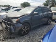 ✅ 2018 Toyota RAV4 XLE • VIN: 2T3WFREV2JW450330 • Lot: 57656175. Listed on Copart with 209,950 mi. Free auction sales archive from the USA and detailed vehicle history report at DreamBid. Image 1.