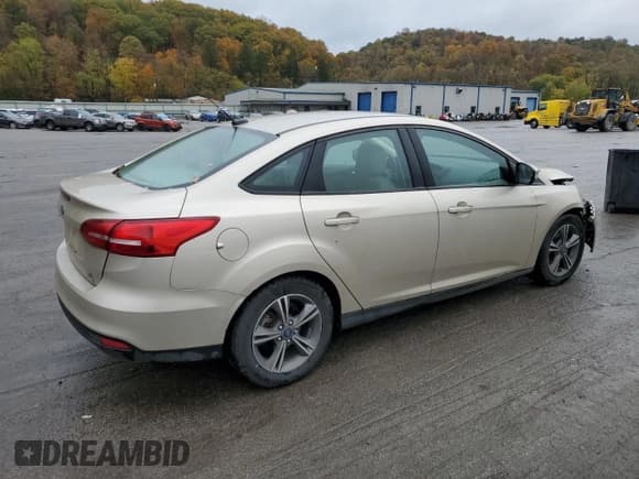 ✅ 2017 Ford Focus SE • VIN: 1FADP3FE1HL283042 • Лот: 90777065. Опубликован ранее на Copart с пробегом 76 323 миль. Бесплатный доступ к архиву аукционных продаж из США и подробный отчёт об истории автомобиля на DreamBid. Изображение 3.