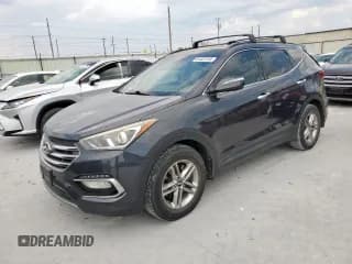 ✅ 2018 Hyundai Santa Fe 2.4L • VIN: 5XYZU3LB3JG503592 • Лот: 81327215. Опубликован ранее на Copart с пробегом 168 074 миль. Бесплатный доступ к архиву аукционных продаж из США и подробный отчёт об истории автомобиля на DreamBid. Изображение 1.