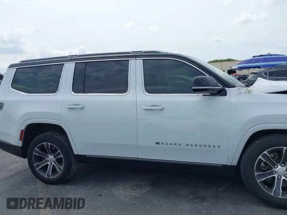 ✅ 2023 Jeep Grand Wagoneer • VIN: 1C4SJVEJ7PS570435 • Lot: 41857510. Listed on IAAI with Not provided. Free auction sales archive from the USA and detailed vehicle history report at DreamBid. Image 13.