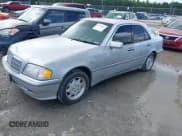 ✅ 1999 Mercedes-Benz C 230/260/280/320 • VIN: WDBHA29GXXA806233 • Lot: 42729874. Listed on IAAI with 312,956 mi. Free auction sales archive from the USA and detailed vehicle history report at DreamBid. Image 2.
