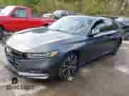 2018 Honda Accord Sport with VIN 1HGCV1F32JA133118, listed as a IAAI auction lot 43329296 with 136,291 mi miles and . Bid and sale history available at DreamBid. Image 2.