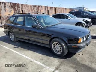 ✅ 1994 BMW 5 Series • VIN: WBAHK2320RGF80960 • Lot: 45525835. Listed on Copart with 255,777 mi. Free auction sales archive from the USA and detailed vehicle history report at DreamBid. Image 4.