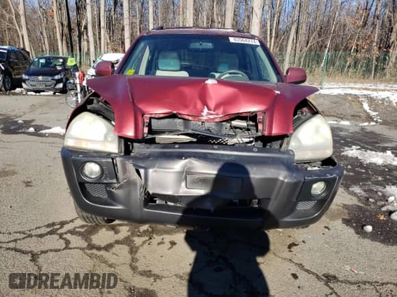 2006 Hyundai Tucson GLS z VIN KM8JN12D66U431452, wystawiony jako Copart lot #83564274 z przebiegiem 229 855 mil mil oraz Szkoda całkowita • Salvage title. Historia ofert i sprzedaży dostępna na DreamBid. Obrazek 5.