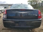 ✅ 2010 Chrysler 300 Touring • VIN: 2C3CA5CV4AH135403 • Лот: 82389715. Опубликован ранее на Copart с пробегом 216 260 миль. Бесплатный доступ к архиву аукционных продаж из США и подробный отчёт об истории автомобиля на DreamBid. Изображение 6.