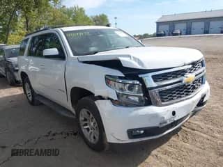 2015 Chevrolet Tahoe LT z VIN 1GNSKBKC3FR279459, wystawiony jako IAAI lot #43349972 z przebiegiem 112 043 mil mil oraz . Historia ofert i sprzedaży dostępna na DreamBid. Obrazek 1.
