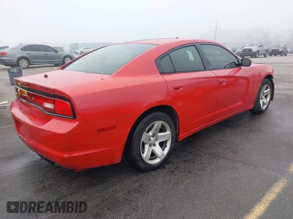 ✅ 2014 Dodge Charger Police • VIN: 2C3CDXAT5EH185995 • Lot: 43590929. Listed on IAAI with 177,171 mi. Free auction sales archive from the USA and detailed vehicle history report at DreamBid. Image 4.