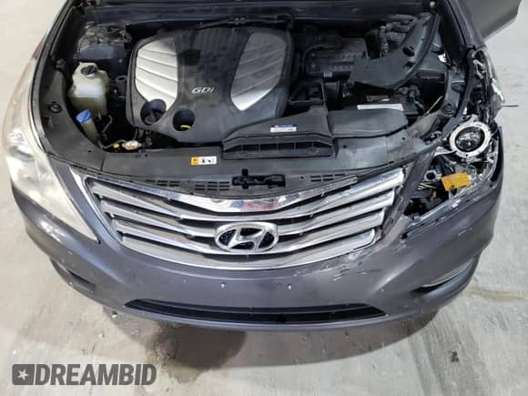 2012 Hyundai Azera с VIN KMHFH4JG9CA149457, выставлен на аукционе Copart как лот 80134214 с пробегом 93 012 миль миль и Списание • Salvage title. История ставок и продаж доступна на DreamBid. Изображение 11.