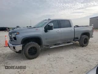 ✅ 2024 Chevrolet Silverado 2500HD LTZ • VIN: 2GC4YPEY0R1105365 • Lot: 61331855. Listed on Copart with 50,665 mi. Free auction sales archive from the USA and detailed vehicle history report at DreamBid. Image 1.