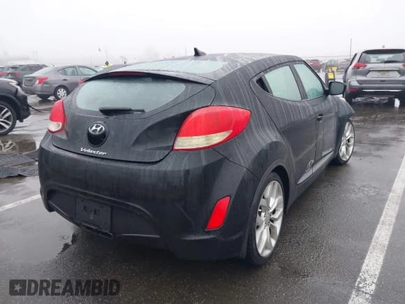 ✅ 2013 Hyundai Veloster w/Black Int • VIN: KMHTC6AD1DU151125 • Lot: 41574616. Wystawiony na IAAI z przebiegiem 98 674 mil. Bezpłatny archiwum sprzedaży aukcyjnych z USA i szczegółowy raport historii pojazdu na DreamBid. Zdjęcie 4.