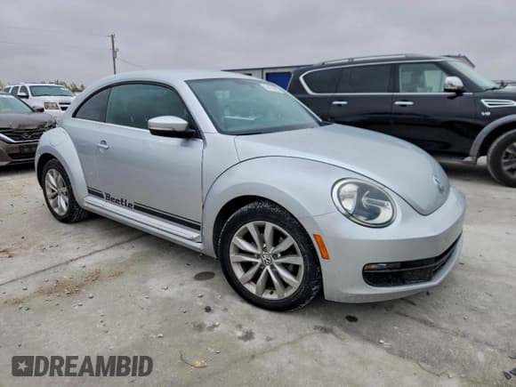 ✅ 2014 Volkswagen Beetle 2.0L TDI w/Sun/Sound/Nav • VIN: 3VWJL7AT5EM632412 • Лот: 94750965. Опубликован ранее на Copart с пробегом 111 421 миль. Бесплатный доступ к архиву аукционных продаж из США и подробный отчёт об истории автомобиля на DreamBid. Изображение 4.