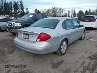 ✅ 2001 Ford Taurus LX • VIN: 1FAFP52U71A176628 • Lot: 43738521. Wystawiony na IAAI z przebiegiem 198 738 mil. Bezpłatny archiwum sprzedaży aukcyjnych z USA i szczegółowy raport historii pojazdu na DreamBid. Zdjęcie 4.