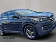 ✅ 2018 Hyundai Santa Fe 2.4L • VIN: 5NMZT3LB0JH081161 • Lot: 95023485. Listed on Copart with 113,359 mi. Free auction sales archive from the USA and detailed vehicle history report at DreamBid. Image 1.