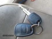 ✅ 2003 Kia Optima LX • VIN: KNAGD128135230517 • Lot: 41228338. Wystawiony na IAAI z przebiegiem 154 946 mil. Bezpłatny archiwum sprzedaży aukcyjnych z USA i szczegółowy raport historii pojazdu na DreamBid. Zdjęcie 11.