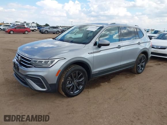 ✅ 2022 Volkswagen Tiguan SE • VIN: 3VV3B7AX3NM008210 • Lot: 43268190. Listed on IAAI with 60,448 mi. Free auction sales archive from the USA and detailed vehicle history report at DreamBid. Image 2.