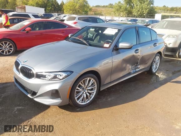 ✅ 2023 BMW 3 Series 330i xDrive • VIN: 3MW89FF02P8D32537 • Lot: 43335072. Listed on IAAI with 26,188 mi. Free auction sales archive from the USA and detailed vehicle history report at DreamBid. Image 2.