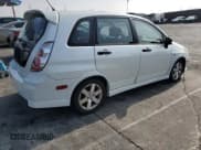 ✅ 2006 Suzuki Aerio Premium • VIN: JS2RC62H065351383 • Lot: 82933084. Wystawiony na Copart z przebiegiem 80 771 mil. Bezpłatny archiwum sprzedaży aukcyjnych z USA i szczegółowy raport historii pojazdu na DreamBid. Zdjęcie 3.