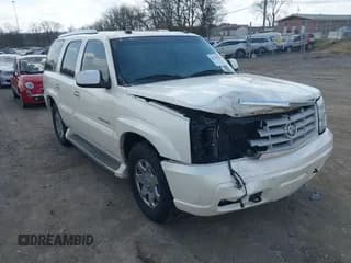 ✅ 2005 Cadillac Escalade • VIN: 1GYEC63T55R115387 • Lot: 41791855. Wystawiony na IAAI z przebiegiem 165 246 mil. Bezpłatny archiwum sprzedaży aukcyjnych z USA i szczegółowy raport historii pojazdu na DreamBid. Zdjęcie 1.