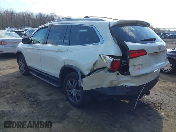 ✅ 2017 Honda Pilot EX-L • VIN: 5FNYF6H71HB061036 • Lot: 41891446. Listed on IAAI with 194,566 mi. Free auction sales archive from the USA and detailed vehicle history report at DreamBid. Image 3.